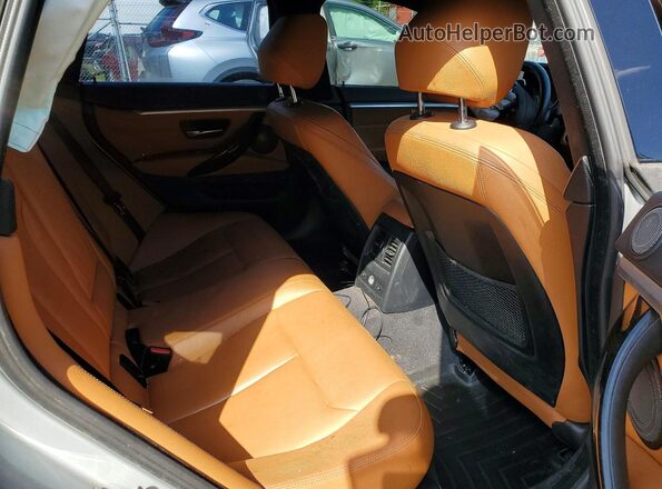 WBA4J7C5XJBH14836 2018 BMW OTHER Silver Rear seats view