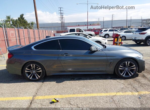 WBA4W3C05LFH25673 2020 BMW 4 SERIES Gray Vista interior trasera