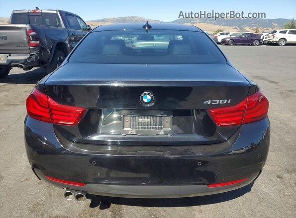 WBA4W3C54KAF92640 2019 BMW 4 SERIES Black Widok z tyłu