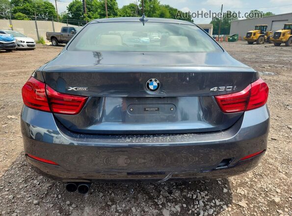 WBA4W5C50KAE49907 2019 BMW OTHER Gray Widok z tyłu