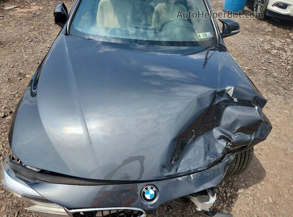 WBA4W5C50KAE49907 2019 BMW OTHER Gray Widok wnętrza z tyłu