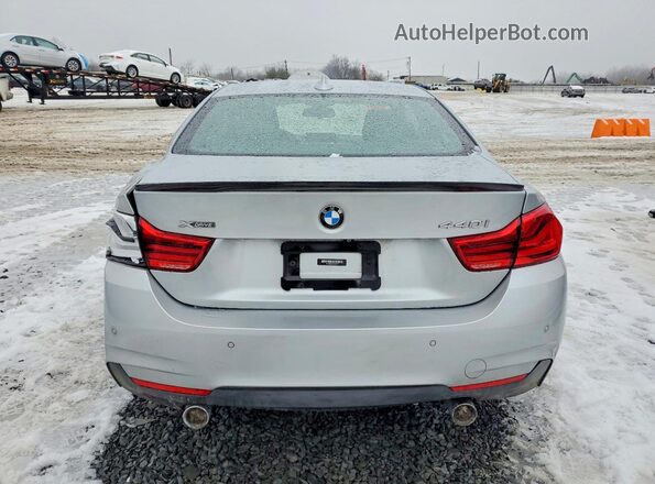 WBA4W9C59JAC09261 2018 BMW 7 SERIES Silver უკანა ხედი