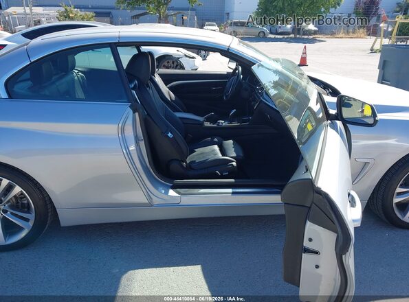 WBA4Z1C50JEC70905 2018 BMW OTHER Silver Front interior view