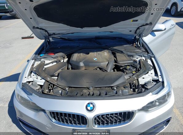 WBA4Z1C50JEC70905 2018 BMW OTHER Silver Rear view