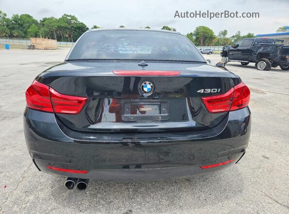 WBA4Z1C51JEC59752 2018 BMW OTHER Black 