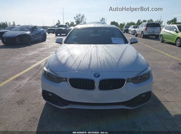 WBA4Z1C56JEC70746 2018 BMW 7 SERIES Белый Вид задней части салона