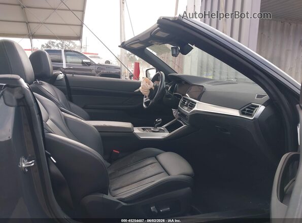 WBA53AT03PCL98115 2023 BMW M4 Gray Widok wnętrza z przodu