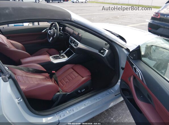 WBA53AT08PCM65467 2023 BMW M4 Gray Widok wnętrza z przodu