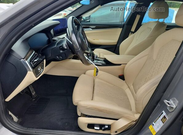 WBA53BH04MCF27802 2021 BMW 5 SERIES Gray Front interior view