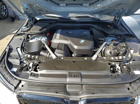 WBA53FJ03SCU28481 2025 BMW 5 SERIES Gray Rear interior view