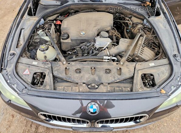 WBA5A5C51GD528962 2016 BMW 5 SERIES Black Widok wnętrza z tyłu