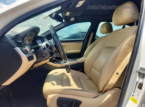 WBA5A5C5XGD529379 2016 BMW 5 SERIES White Front interior view