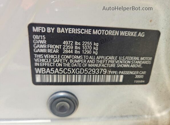 WBA5A5C5XGD529379 2016 BMW 5 SERIES White Engine compartment view