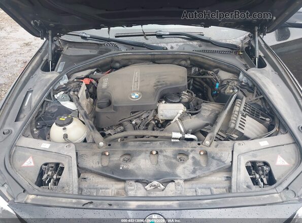 WBA5A7C58GG146003 2016 BMW 5 SERIES Black Rear view