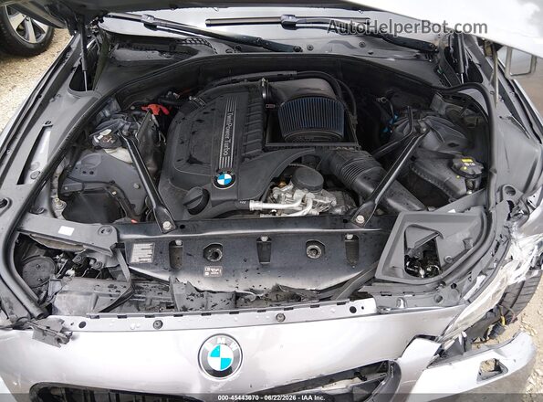 WBA5B1C51GG551615 2016 BMW 5 SERIES Gray Rear view