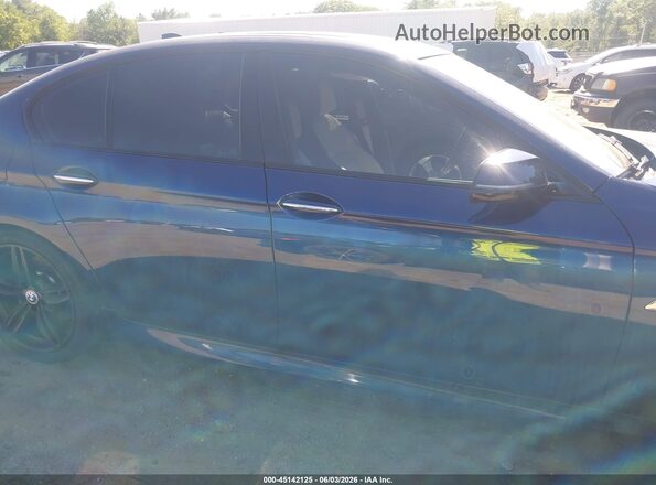 WBA5B3C52GG255806 2016 BMW 5 SERIES Синий Вид задней части салона