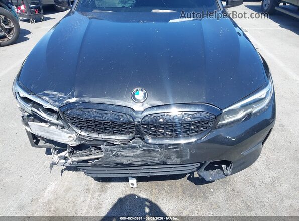 WBA5R1C55KAK06949 2019 BMW 3 SERIES Black Front view