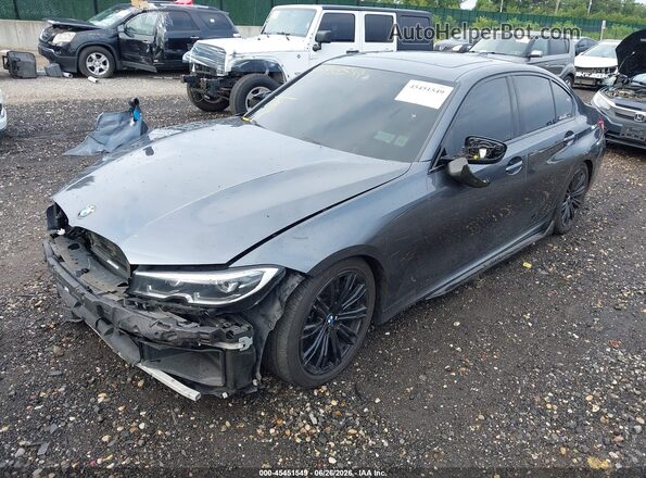 WBA5U7C04LFH07487 2020 BMW M3 Gray Front left