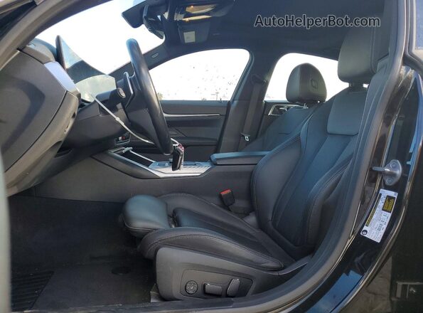 WBA63AV00RFS57604 2024 BMW OTHER Black Front interior view