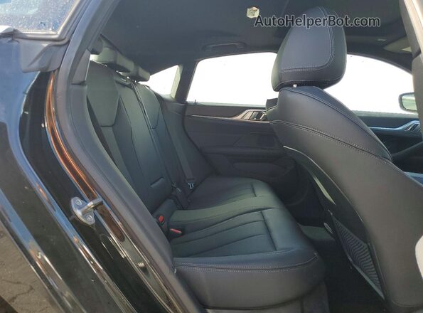 WBA63AV00RFS57604 2024 BMW OTHER Black Rear seats view