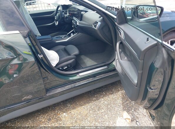 WBA63AV02RFS00479 2024 BMW 4 SERIES Green Widok wnętrza z przodu