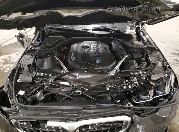 WBA63FJ04TCV85491 2026 BMW 5 SERIES Charcoal Vista interior trasera