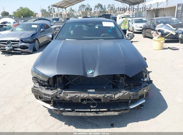 WBA63FJ07TCV77045 2026 BMW 5 SERIES Black Սալոնի հետևի տեսք