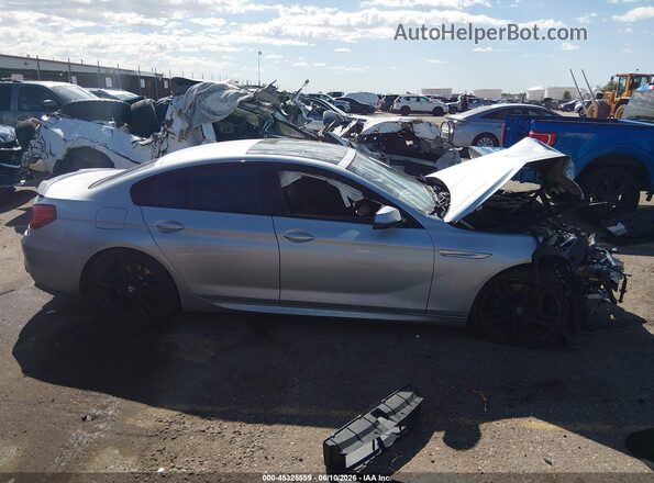 WBA6D6C52GGF94715 2016 BMW 6 SERIES Silver Widok wnętrza z tyłu