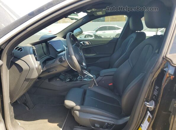 WBA73AK06M7H33188 2021 BMW OTHER Black Front interior view