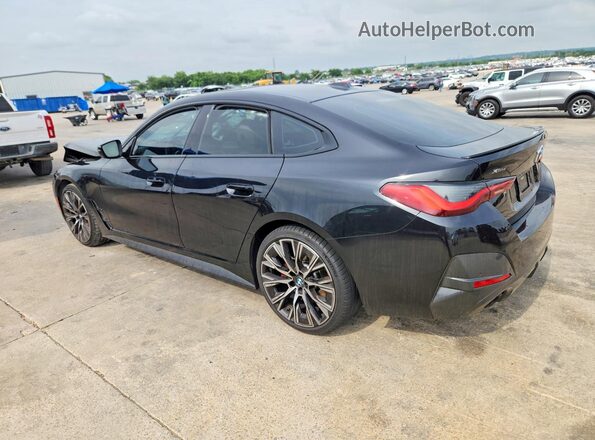 WBA73AV0XPFN55868 2023 BMW 4 SERIES Black Հետևի ձախ