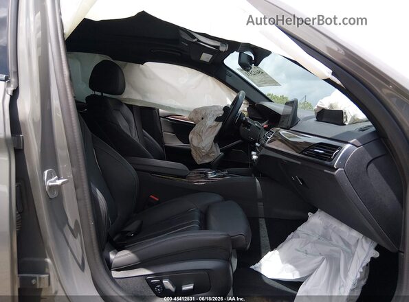 WBA73BJ0XMWX12984 2021 BMW 5 SERIES Gray წინა სალონის ხედი