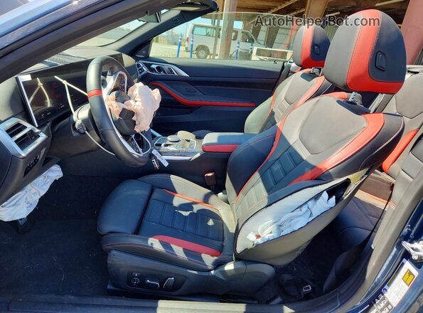 WBA73DB02SCU00148 2025 BMW M4 Blue Front interior view