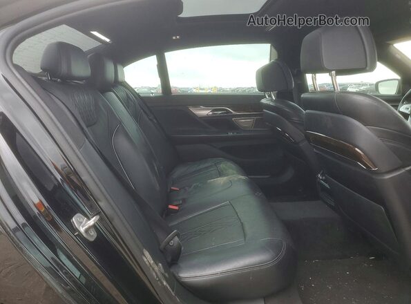 WBA7E2C56GG504764 2016 BMW 7 SERIES Black Vista de los asientos traseros