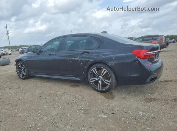 WBA7E2C56GG504764 2016 BMW 7 SERIES Black Trasero izquierdo