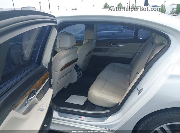 WBA7E2C57GG547011 2016 BMW 7 SERIES White Widok naklejki z numerem VIN