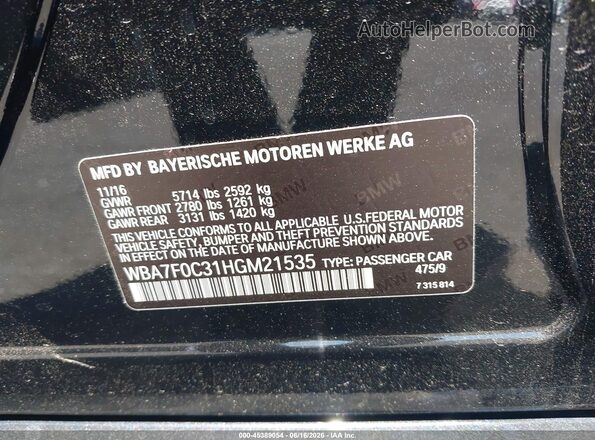 WBA7F0C31HGM21535 2017 BMW 7 SERIES Black Vista del compartimento del motor