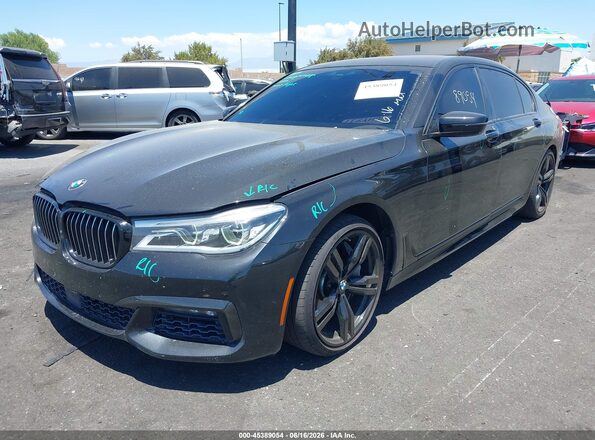 WBA7F0C31HGM21535 2017 BMW 7 SERIES Black Vista tres cuartos delantera izquierda
