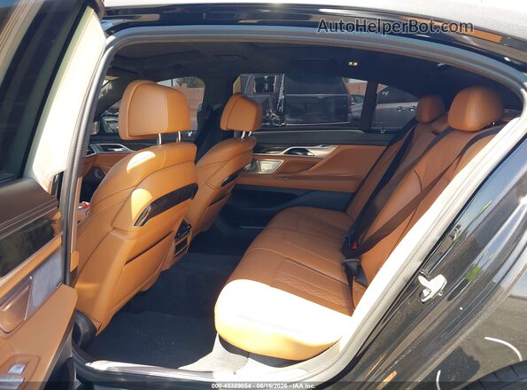 WBA7F0C31HGM21535 2017 BMW 7 SERIES Black Vista de la etiqueta del VIN