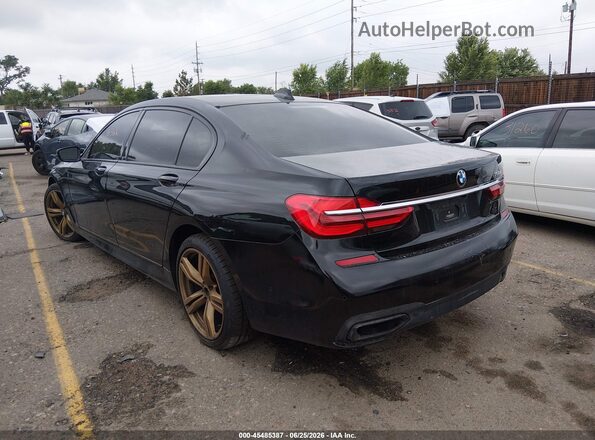 WBA7F0C32HGM21544 2017 BMW 7 SERIES Black Tył lewy