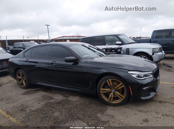 WBA7F0C32HGM21544 2017 BMW 7 SERIES Black Widok wnętrza z tyłu