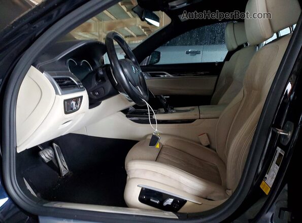 WBA7F0C32HGM21589 2017 BMW 7 SERIES Blue Вид салону спереду