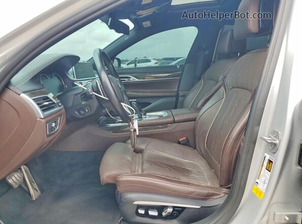 WBA7F0C33HGM21603 2017 BMW 7 SERIES Серебряный Вид салона спереди