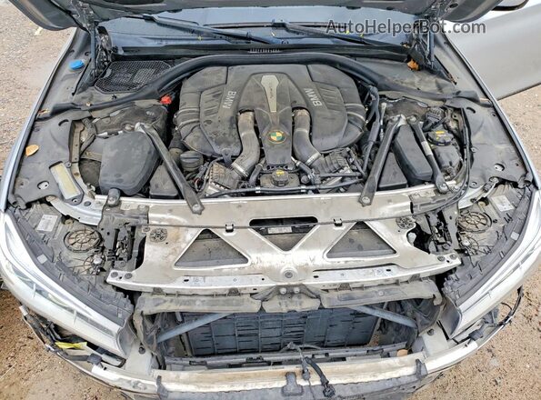 WBA7F0C33HGM21603 2017 BMW 7 SERIES Серебряный Вид задней части салона