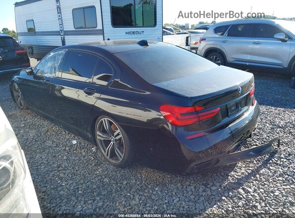 WBA7F0C37HGM22110 2017 BMW 7 SERIES Black Rear left