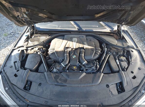 WBA7F0C37HGM22110 2017 BMW 7 SERIES Black Rear view