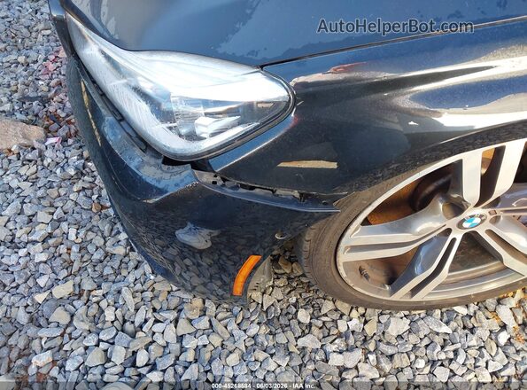 WBA7F0C37HGM22110 2017 BMW 7 SERIES Black Front view
