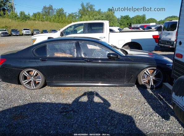 WBA7F0C37HGM22110 2017 BMW 7 SERIES Black Rear interior view