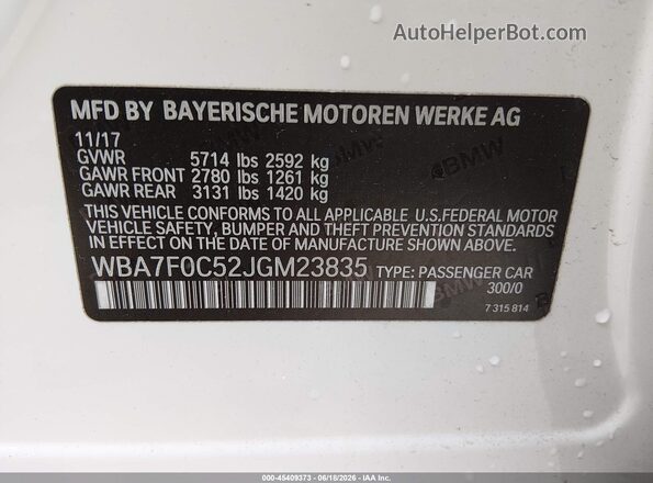 WBA7F0C52JGM23835 2018 BMW 7 SERIES White Vista del compartimento del motor