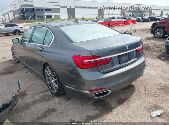 WBA7F0C53GGL99716 2016 BMW 7 SERIES Gray Trasero izquierdo