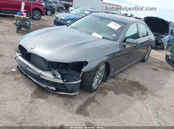 WBA7F0C53GGL99716 2016 BMW 7 SERIES Gray Vista tres cuartos delantera izquierda